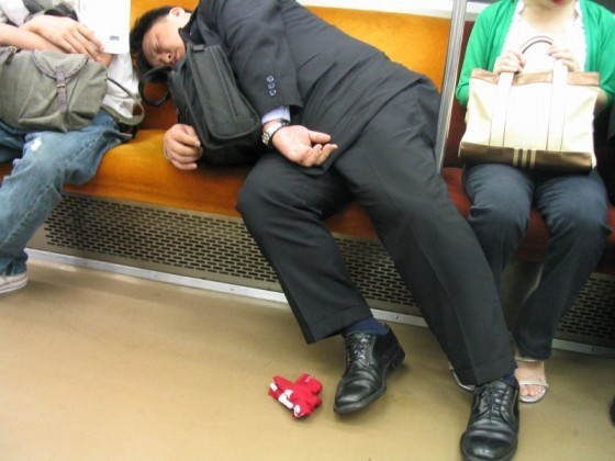 Salaryman_asleep_on_the_Tokyo_Subway